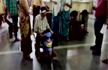 Unable to pay bribe for wheelchair, patient uses toy tricycle